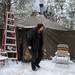 Paul Harris exits one of the camp's common spaces at Camp Take Notice on Tuesday. Melanie Maxwell I AnnArbor.com